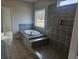 Gorgeous bathroom featuring soaking tub and walk-in shower with stylish gray tile at 3292 Lions Ruby Ln, Atlanta, GA 30349