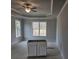 Spacious bedroom with a ceiling fan and tray ceiling design at 3292 Lions Ruby Ln, Atlanta, GA 30349