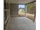 Covered patio of a new home featuring a concrete floor and view of the large backyard at 3292 Lions Ruby Ln, Atlanta, GA 30349