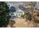 Aerial view of the home with a back patio and landscaped yard at 3377 Fielders Pt, Dacula, GA 30019