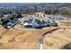 Aerial image of the expansive clubhouse situated on well maintained grounds at 3377 Fielders Pt, Dacula, GA 30019