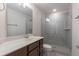 Modern bathroom with glass shower and updated vanity at 601 Cork St, Woodstock, GA 30188