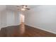 Spacious bedroom with hardwood floors and ceiling fan at 601 Cork St, Woodstock, GA 30188