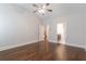 Main bedroom with hardwood floors and ensuite bathroom at 601 Cork St, Woodstock, GA 30188