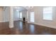 Spacious dining room features hardwood floors and a fireplace at 601 Cork St, Woodstock, GA 30188