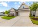 Craftsman style home with a 2-car garage and nicely landscaped yard at 601 Cork St, Woodstock, GA 30188