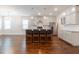 Modern kitchen features a large island, stainless steel appliances, and hardwood floors at 601 Cork St, Woodstock, GA 30188