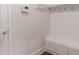 Bright mudroom with built-in bench and hooks for storage at 601 Cork St, Woodstock, GA 30188