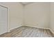 Bedroom featuring a closet and updated flooring at 601 Formwalt Sw St, Atlanta, GA 30312