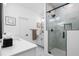 Spa-like bathroom with a large walk-in shower and marble tile at 1076 Brookglynn Trce, Decatur, GA 30032