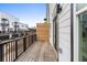 Private deck with wood flooring and black railing, offering an outdoor space at 1076 Brookglynn Trce, Decatur, GA 30032