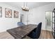 Elegant dining room with dark wood table and modern chairs at 1076 Brookglynn Trce, Decatur, GA 30032