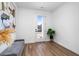 Modern entryway with glass door and wood floors at 1076 Brookglynn Trce, Decatur, GA 30032