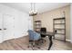 Modern home office with wood desk and accent wall at 1076 Brookglynn Trce, Decatur, GA 30032