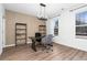 Spacious home office with large windows and wood floors at 1076 Brookglynn Trce, Decatur, GA 30032