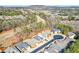 Picturesque neighborhood featuring beautiful homes, lush greenery, and convenient access to a golf course at 221 Aster Ct, Canton, GA 30114