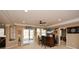 Basement area with a bar, stools, and sliding doors to the backyard at 221 Aster Ct, Canton, GA 30114