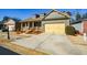 Beautiful home showcasing a cozy front porch, tidy lawn, and a two-car garage for convenient parking at 221 Aster Ct, Canton, GA 30114