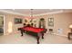 Game room with a billiards table and overhead lighting fixture at 221 Aster Ct, Canton, GA 30114