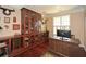 Well-appointed home office with built-in bookshelves and a large desk, perfect for productivity at 221 Aster Ct, Canton, GA 30114