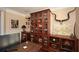Comfortable home office features custom built-ins and ample desk space for remote work at 221 Aster Ct, Canton, GA 30114