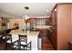 Spacious kitchen with granite countertops, stainless steel appliances, and wood cabinets at 221 Aster Ct, Canton, GA 30114