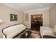 Cozy living room with decorative rug, white sofa, and view into formal dining room at 221 Aster Ct, Canton, GA 30114