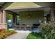 Outdoor pavilion with dining tables, ceiling fans, and landscaping providing a relaxing setting at 221 Aster Ct, Canton, GA 30114