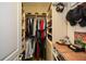 Well-organized walk-in closet with custom shelving, hanging space, and storage accessories at 221 Aster Ct, Canton, GA 30114