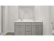 Modern bathroom vanity with double sinks and ample storage at 281 Kenoot Dr # 36, Mcdonough, GA 30253