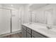 Bathroom featuring double sink vanity, shower and subway tile at 281 Kenoot Dr # 36, Mcdonough, GA 30253