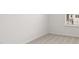 Bright bedroom with neutral carpet and trim, featuring a large window at 281 Kenoot Dr # 36, Mcdonough, GA 30253
