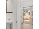 Small half bathroom with pedestal sink, located conveniently near the entryway at 281 Kenoot Dr # 36, Mcdonough, GA 30253