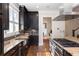 Modern kitchen featuring stainless steel appliances and a farmhouse sink at 334 Greenwood Ave, Decatur, GA 30030