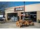 Exterior of Oakhurst Market with outdoor seating at 334 Greenwood Ave, Decatur, GA 30030