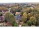 Birds eye view of house in wooded neighborhood at 580 Meadows Creek Dr, Johns Creek, GA 30005