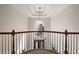 Elegant foyer with high ceilings, chandelier, and grand staircase, creating a welcoming entrance to the home at 580 Meadows Creek Dr, Johns Creek, GA 30005