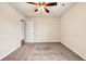 Spacious bedroom with neutral walls and carpet at 11119 Torino Dr, Hampton, GA 30228