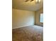 Bright bedroom with neutral walls and carpet at 11119 Torino Dr, Hampton, GA 30228