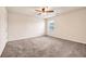 Bright bedroom featuring neutral walls and carpet at 11119 Torino Dr, Hampton, GA 30228