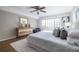 This bedroom has a well-lit room, a neutral palette, and hardwood floors at 410 Candler Park Ne Dr # C-1, Atlanta, GA 30307