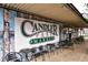 Exterior view of Candler Park Market, showing the building, mural and outdoor seating at 410 Candler Park Ne Dr # C-1, Atlanta, GA 30307