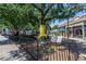 Lively neighborhood street featuring a large tree with decorative covering at 410 Candler Park Ne Dr # C-1, Atlanta, GA 30307