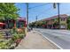 Picturesque view of a commercial area with retail shops and sidewalk seating at 410 Candler Park Ne Dr # C-1, Atlanta, GA 30307