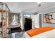 Well-lit bedroom showcases hardwood floors, a window seat, and a decorative shelving unit at 54 Basswood Cir, Atlanta, GA 30328