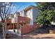 Backyard view featuring a patio, fencing, and the rear of the home at 54 Basswood Cir, Atlanta, GA 30328