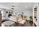 A serene main bedroom with hardwood floors, a sitting area, and elegant decor at 54 Basswood Cir, Atlanta, GA 30328