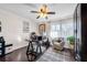 Home office featuring hardwood floors, a ceiling fan, and a comfortable seating area at 54 Basswood Cir, Atlanta, GA 30328