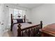 Classic bedroom showcasing ornate dark wood furniture, plush bedding, and natural light from a window at 1611 Saddlegate Dr, Canton, GA 30114