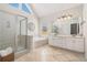 Elegant bathroom with double vanity, soaking tub, and walk-in shower at 179 Waterstone Pt, Acworth, GA 30101